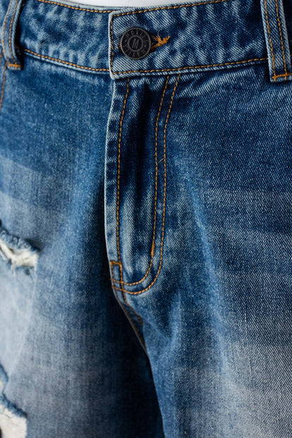  SHORT DE MOVIES EN DENIM TONO MEDIO CON ROTOS PARA MUJER